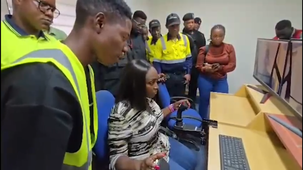 MDF Administrator, Dr. Hanna Bisiw-Kotei, operates the AngloGold Ashanti simulator.